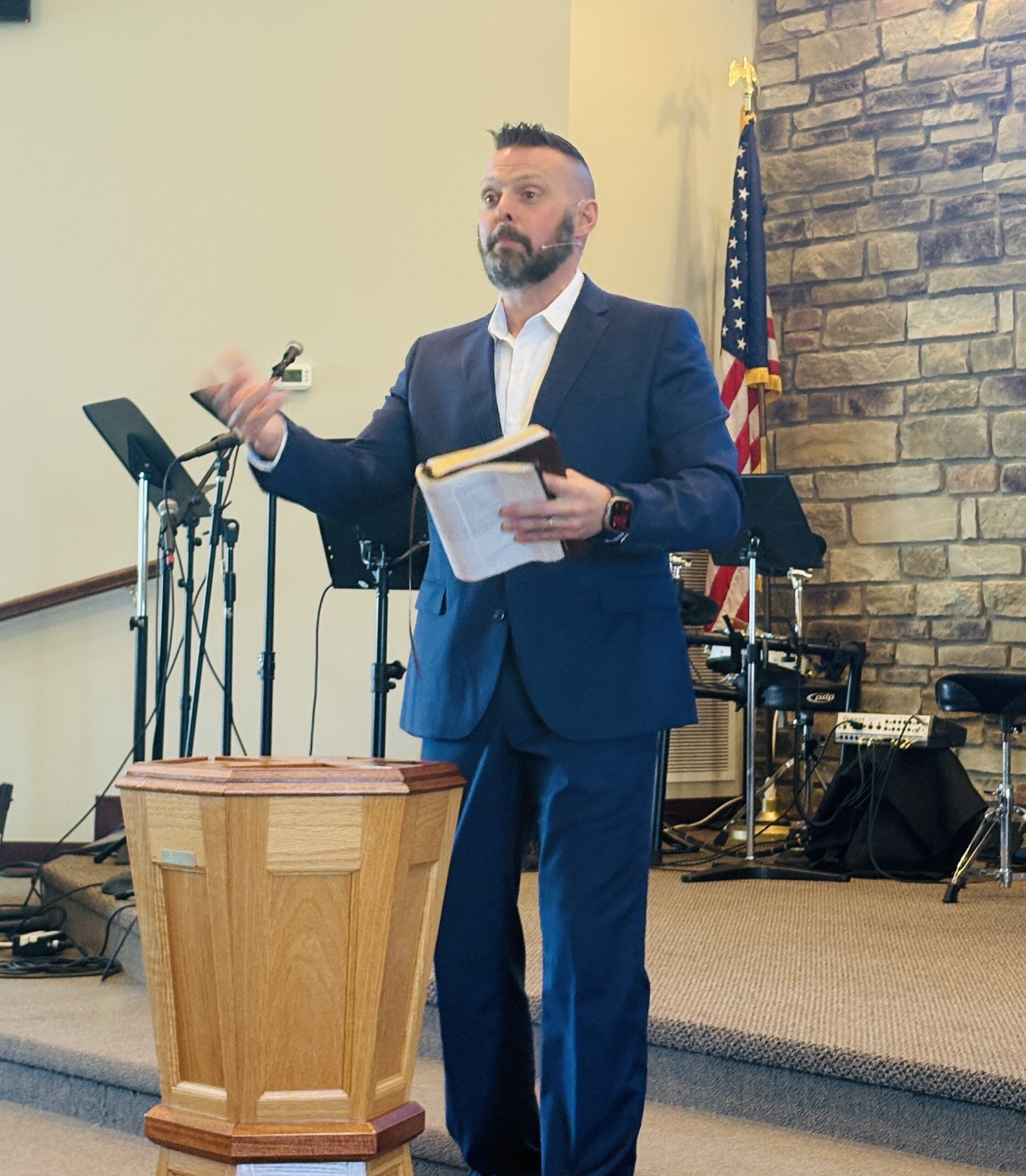 Pastor Derrick preaching